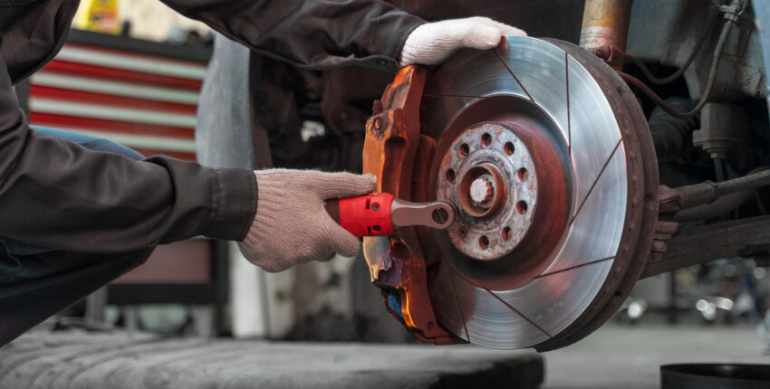 Expert mechanic conducting brake repairs